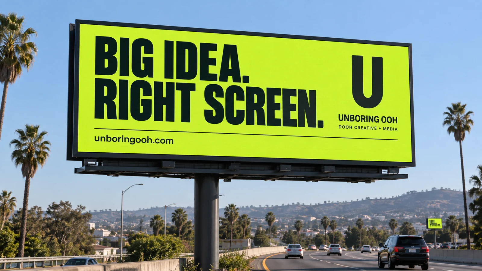 Unboring OOH ad on roadside digital billboards. The ad reads: BIG IDEA. RIGHT SCREEN.